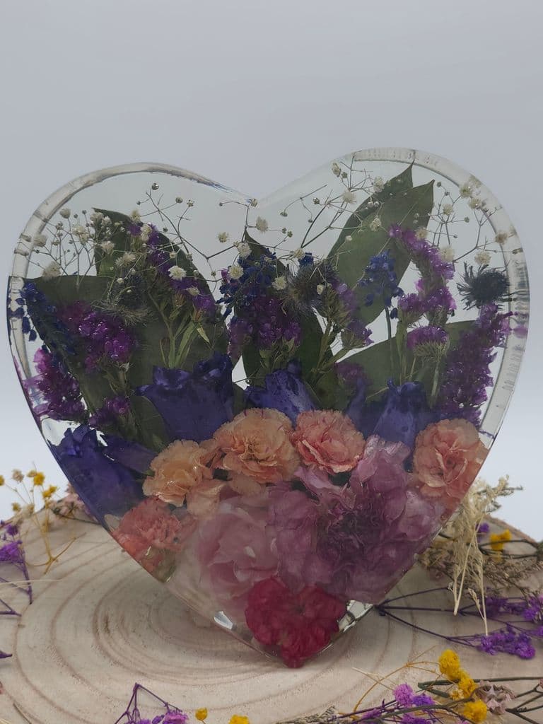 Front facing heart for flower preservation for weddings, memorial gifts, special occasion gifts. Flowers cast in resin in Cambridgeshire